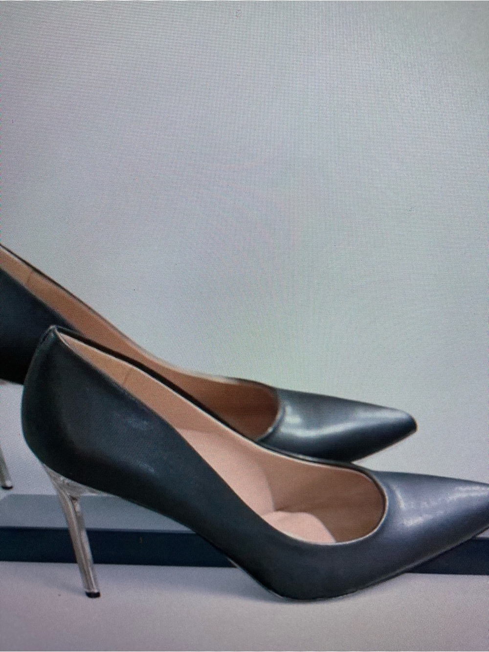 Sleek Black Pointed-Toe Stiletto Pumps with Metallic Heel